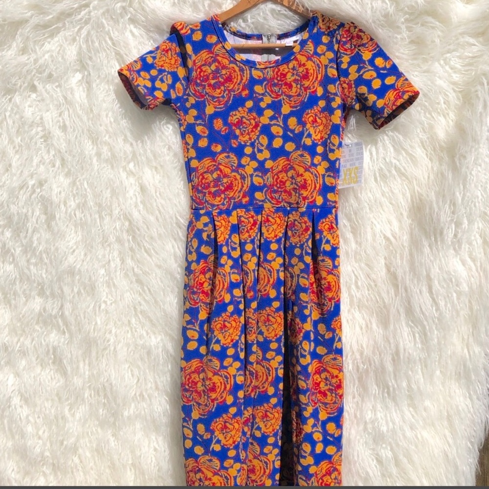 Gold print flowers on a blue Lularoe Amelia dress